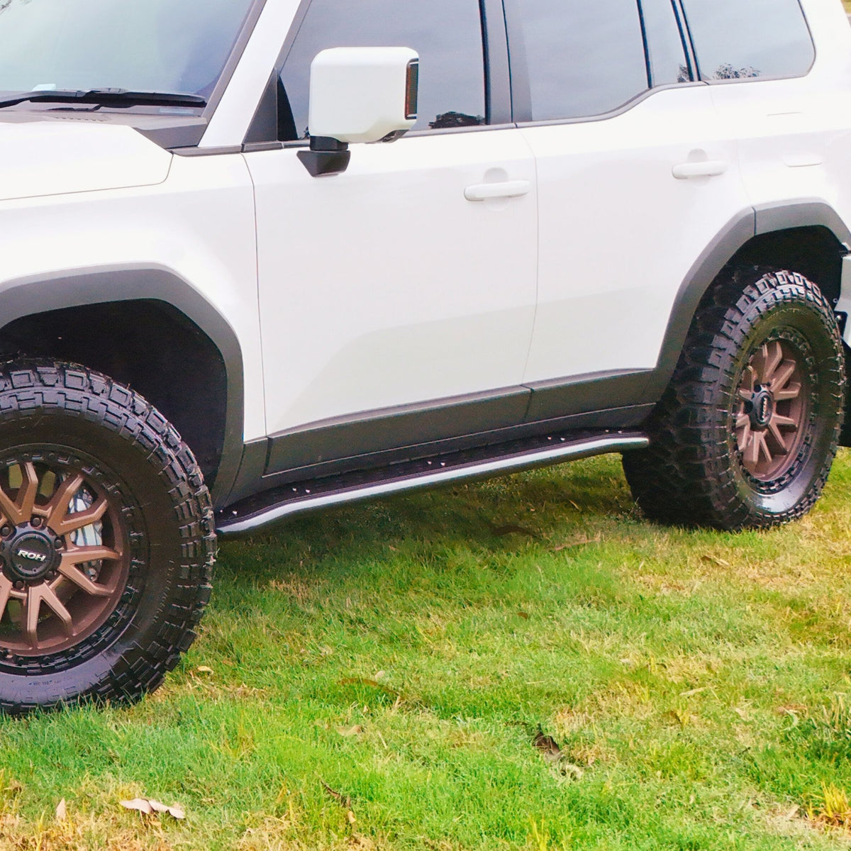 This is an image of the 250 Series Prado Toyota Landcruiser Rock Sliders and side steps by Raslarr Engineering. Made in Australia White Black (2)