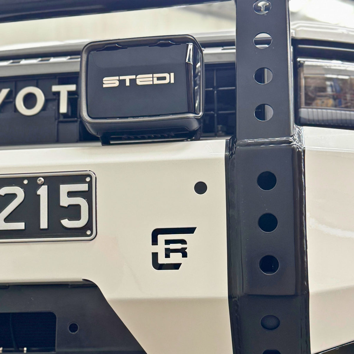 This is an image of the new Raslarr Dallas Bull Bar Toyota Landcruiser Prado 250 Series White Black fog lights right hand side