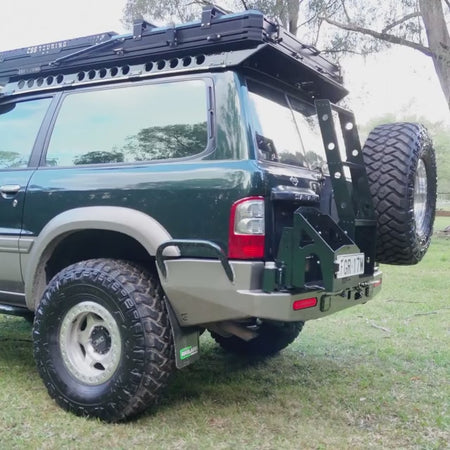 Raslarr Green & Gold GU Patrol Rear Bar Wheel Carrier with ladder and jerry can holder video.mp4